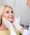 Smiling Woman Receiving Professional Skin Consultation for Antiaging Treatments – Before and After Gallery